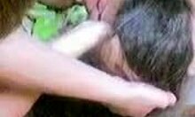 dark-haired amateur playfully sucking hot dick with long hair