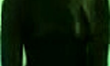 blonde milf in lingerie dances enticingly on cam.