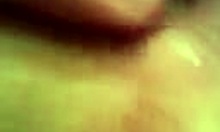 Detailed close-up view of a horny amateur wife getting her anal fingered intensely by her partner.