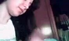 Brunette wife boldly blows and strokes cock like a professional in homemade scene.