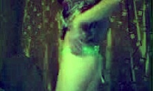 Look at this teen stripping her green panties and bra