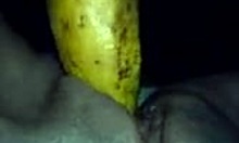 horny amateur goes wild with a banana on camera, close-up of her shaved pussy masturbation.