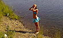 blond-haired amateur in cute bikini shows off outdoors