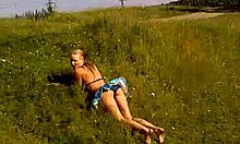 blond-haired amateur in cute bikini shows off outdoors