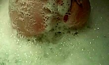 soapy amateur gets blowjob and masturbation during mff threesome in the bath