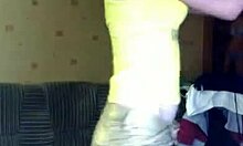 Want to see my big tits? she asks while stripping.