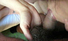 Dark-haired amateur sucking extremely hairy cock in homemade POV