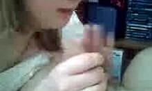 short-haired blonde blows big-dicked dude on cam