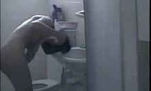 dark-haired beauty in shower blowjob