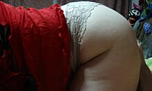 Wow! Short-Haired Mature Sucks Cock Right by the TV!