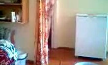 brown-haired hottie shows her perky tits and fat body solo