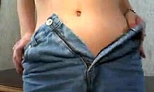 Ponytailed Woman Performs a Teasing Striptease