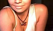 Exotic latina amateur girlfriend shows off her tattoo during striptease