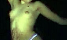 two gorgeous girlfriends making out on stage