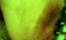 big pussy plays with rubber toys close-up