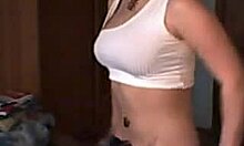 Exotic latina amateur girlfriend shows off her tattoo during striptease