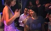 two gorgeous girlfriends making out on stage