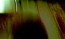 Dark-haired chick fingering in POV doggystyle!