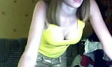 Want to see my big tits? she asks while stripping.