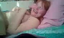 A redheaded bbw amateur gets deepthroat blowjob while laying down.