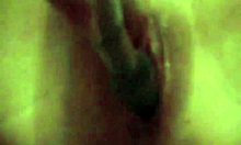 big pussy plays with rubber toys close-up