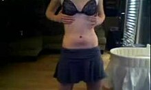 Skirt-Wearing Brunette Showing Off Her Beautiful Body