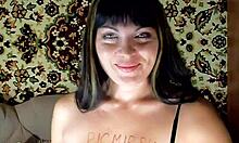 Trashy-looking brunette masturbates with hot toy on big tits