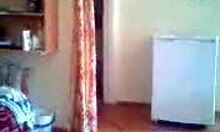 brown-haired hottie shows her perky tits and fat body solo