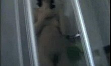 dark-haired beauty in shower blowjob