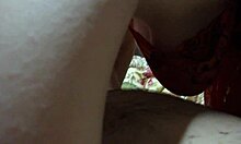 Wow! Short-Haired Mature Sucks Cock Right by the TV!