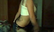 Exotic latina amateur girlfriend shows off her tattoo during striptease