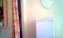 brown-haired hottie shows her perky tits and fat body solo