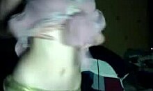 Want to see my big tits? she asks while stripping.