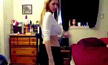 busty blond-haired amateur stripping next to the bed 😏