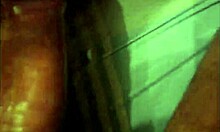 In this close-up view, an amateur engages in doggystyle fucking, with her shaved pussy getting gaped wide.