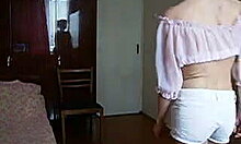 blonde babe strips and dances in shorts