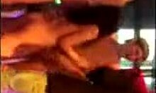 Brunette amateur strips naked and dances wildly on the night club stage