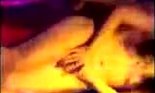 Brunette amateur strips naked and dances wildly on the night club stage