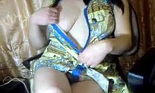 A Russian brunette housewife shares her big natural tits and pussy in a solo show.