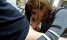 redheaded minx sucking this guy's cock at work 😜