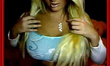 Blond-Haired Busty Cutie Teasingly Reveals Her Juicy Jugs on Cam