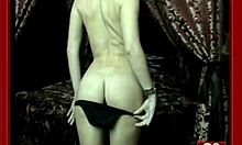 pale-skinned teen teasing herself on a chic bed