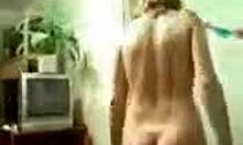 Playful chubby MILF dances half-naked on holiday