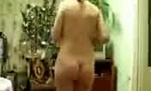 Playful chubby MILF dances half-naked on holiday