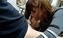 redheaded minx sucking this guy's cock at work 😜