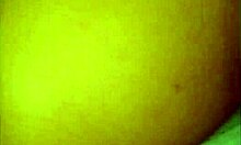 In this close-up view, an amateur engages in doggystyle fucking, with her shaved pussy getting gaped wide.