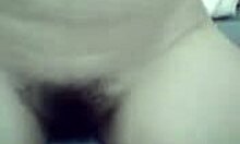 Watch her flash that bushy pussy.