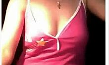 Wow, this redhead teases with her huge tits!