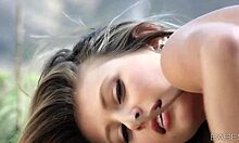 Lauren Clare fingers her shaved pussy alone, moaning softly.