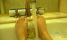 sensual blonde teen 18+ enjoying a solo bath, all by herself